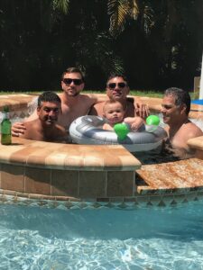 Ramon with his son and family in Florida.