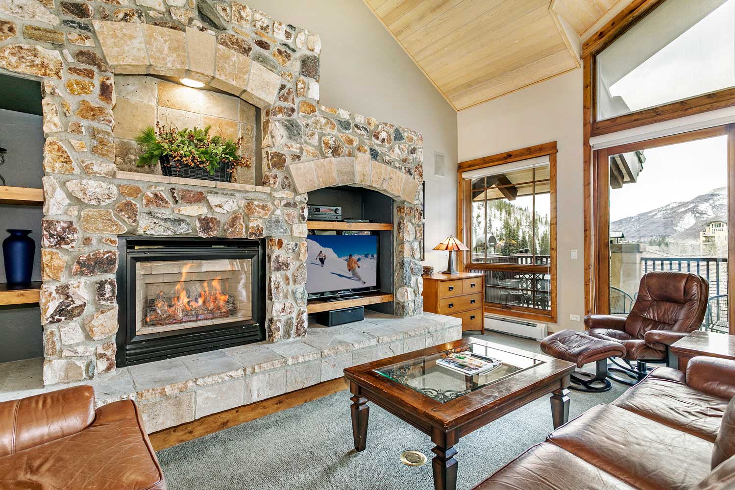 Living room with gas fireplace antlers 514