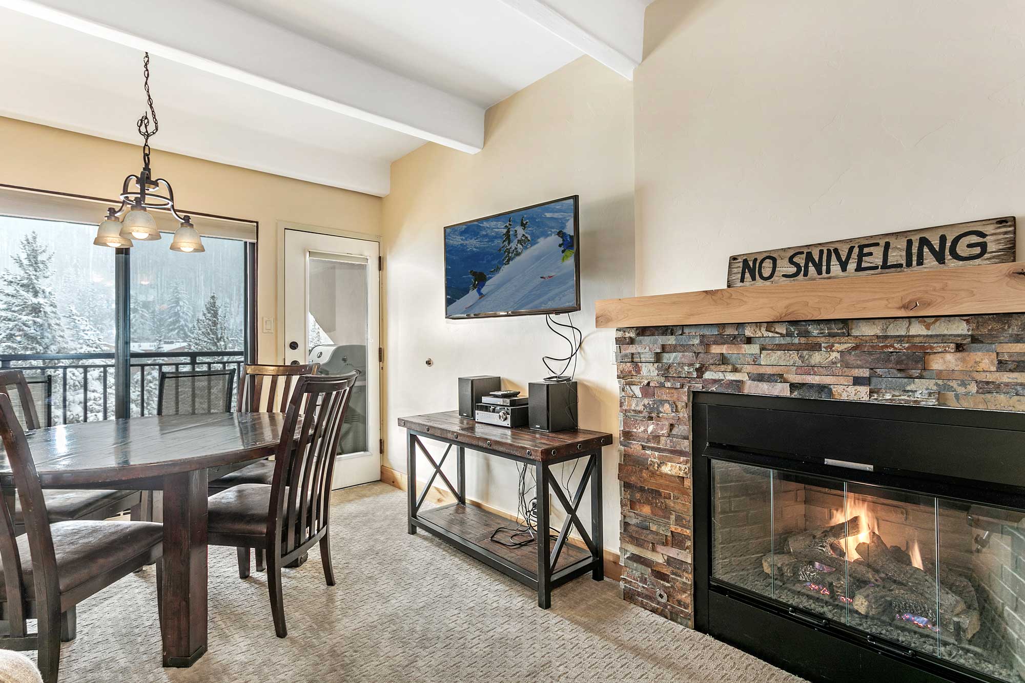 View of dining room and fireplace unit 604 Antlers at vail