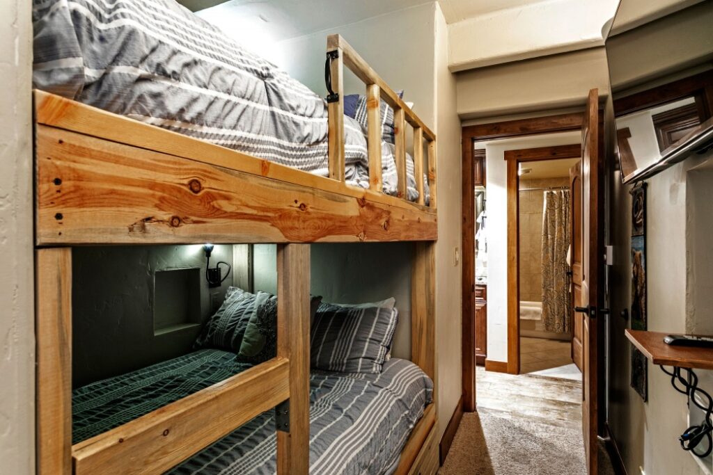 View of bunk beds and bathroom condo 106 Antlers at Vail