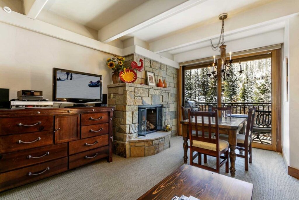 View of living room and dining room condo 111 Antlers at Vail