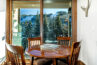 Dining area of Antlers at Vail condo 403 with views of the ski mountain