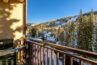 Winter view of the mountain and creek from the balcony of Antlers at Vail condo 403