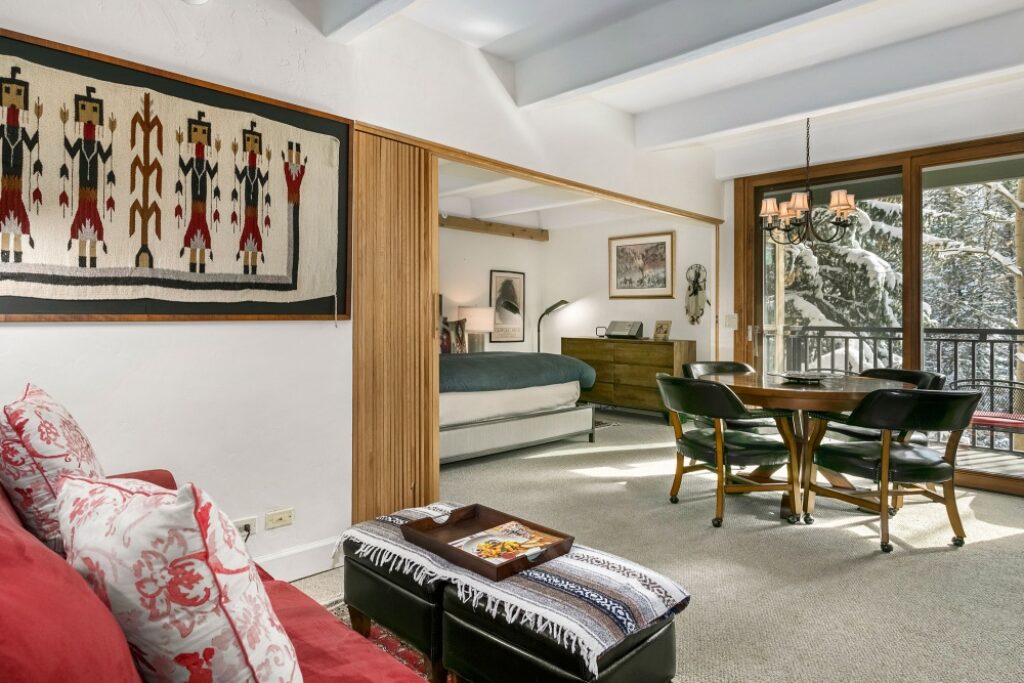 dining area and bedroom of studio 208 at antlers at vail