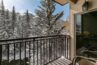 View of snowy balcony of condo 303 Antlers at Vail