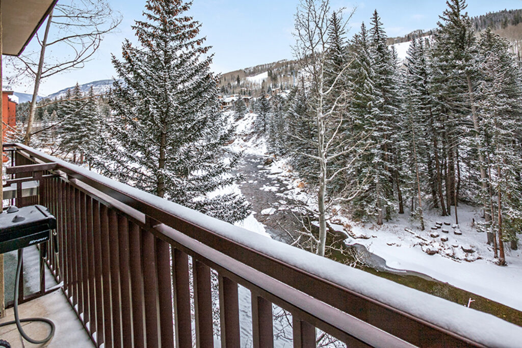 View of snowy gore creek from balcony of condo 305 Antlers at Vail