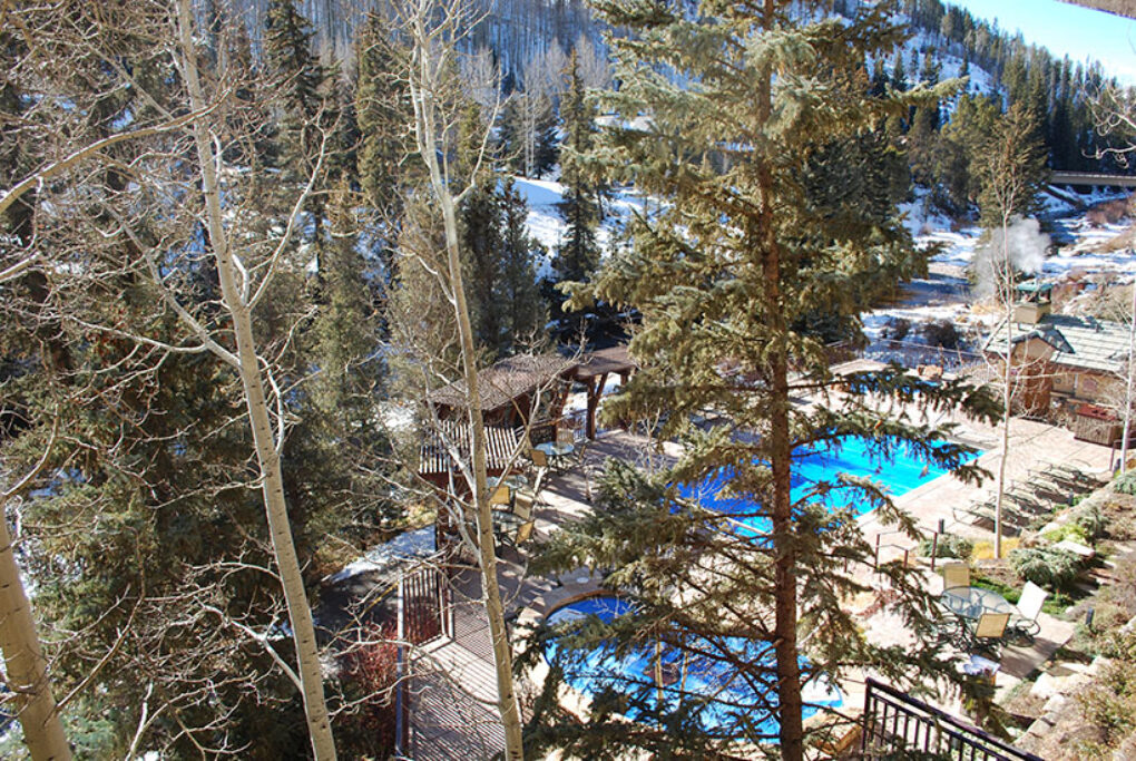 Winter view of Gore the pool and river from Antlers at Vail condo 308