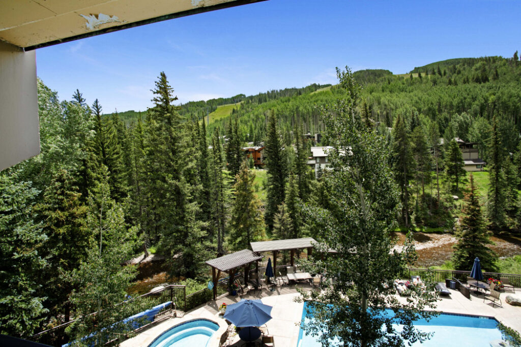 View of Vail Mountain and Antlers pool from balcony of condo 311 Antlers at Vail