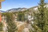 view from balcony of gore creek and Vail Mountain condo 506 Antlers at Vail