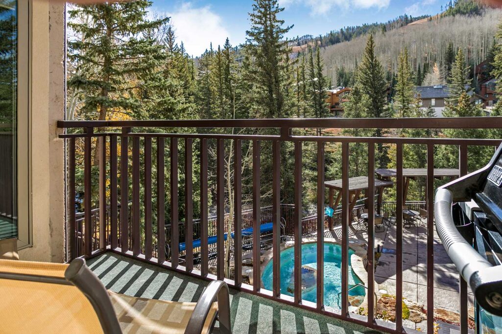 View of Antlers hot tub from balcony of condo 210 Antlers at Vail
