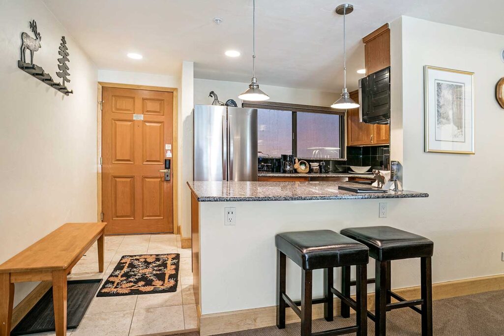 View of kitchen and entry way condo 210 Antlers at vail
