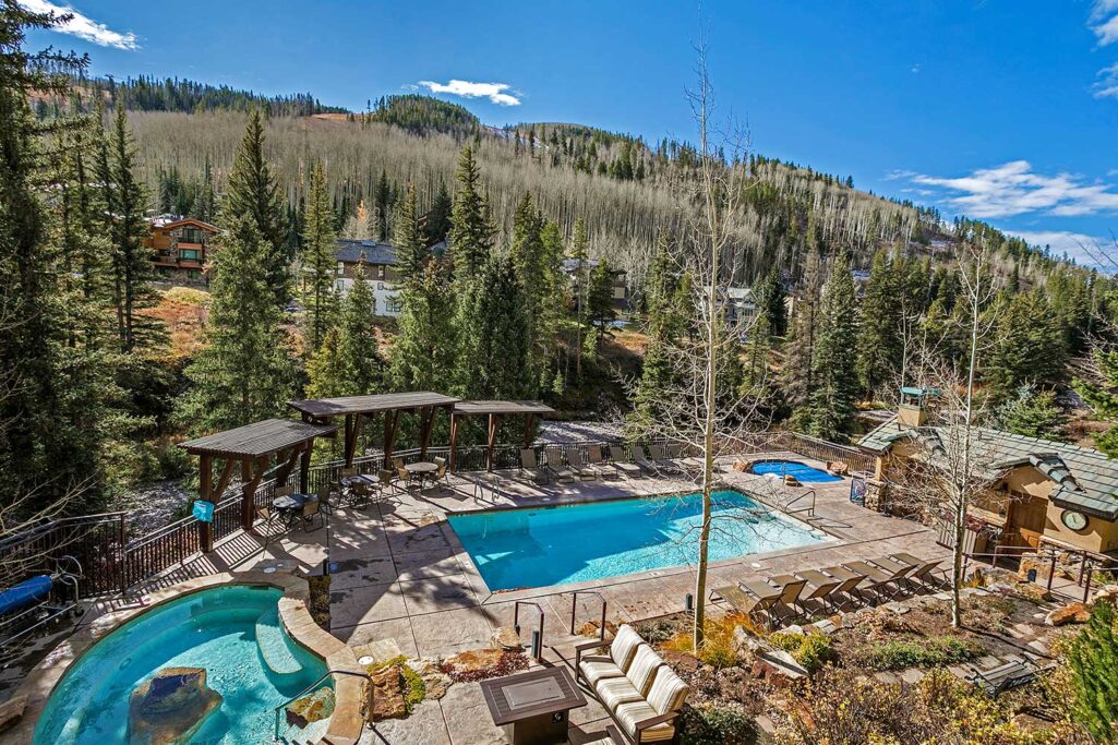 View of pool and Vail Mountain from balcony of condo 210 Antlers at Vail