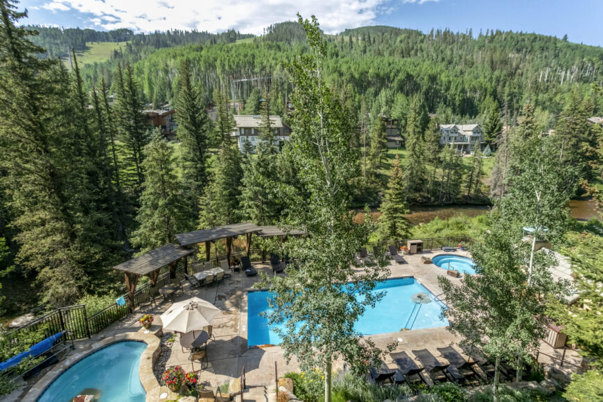 View of Antlers pool and Vail Mountain from balcony of condo 204 Antlers at Vail
