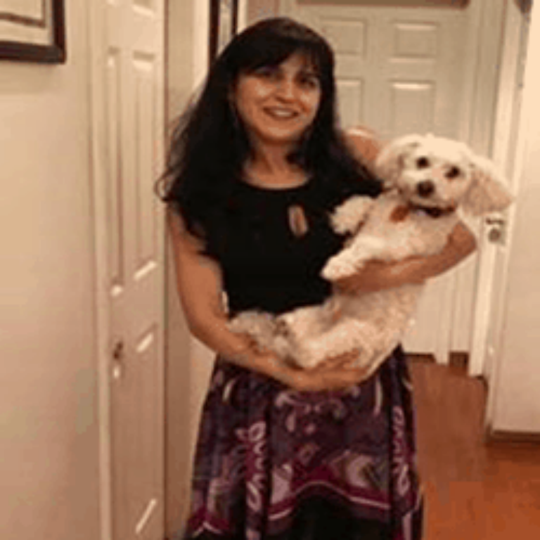 Antlers housekeeper, Myrna, with one of her three dogs