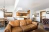 Spacious living, dining and kitchen areas of Antlers at Vail residence 519