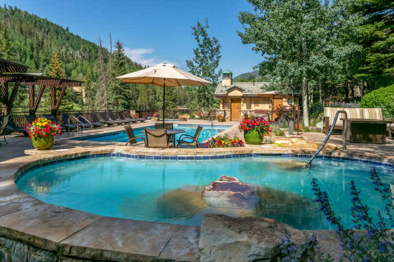 antlers at vail pool and hot tubs on a summer day