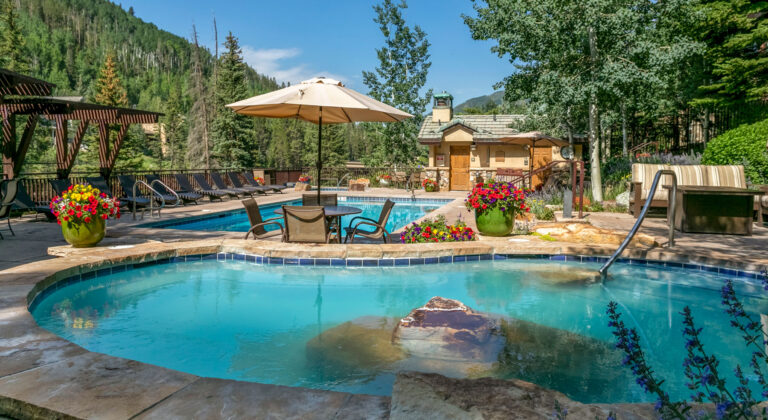 antlers at vail pool and hot tubs on a summer day