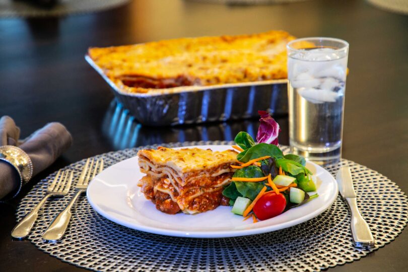lasagne and salad on a plate