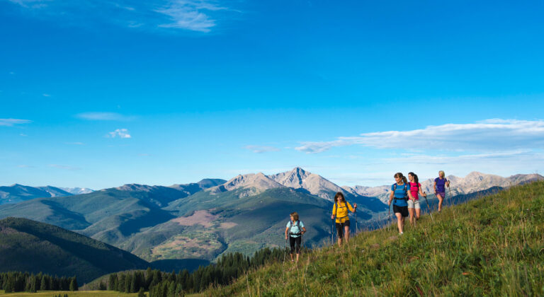 group hiking on vail mountain