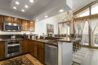 fully equipped kitchen and dining area of antlers at vail residence 518