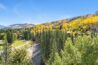 Balcony of Antlers at Vail 707 with view of fall colors on Vail Mountain and Gore Range in the background