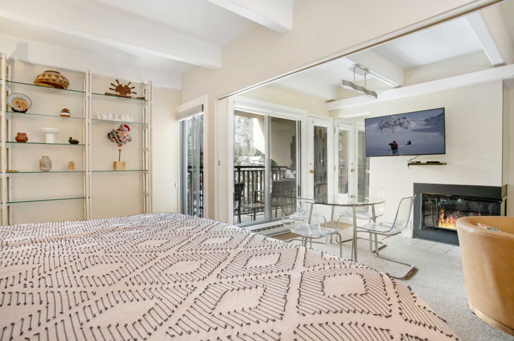 Bedroom and dining area of Antlers at Vail studio condo 310