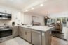 Bright kitchen, dining and living area of Antlers at Vail condo 321