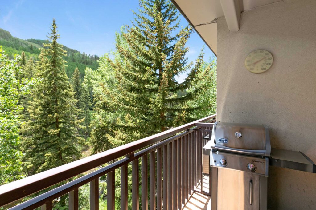 Antlers at Vail unit 304 balcony with views of the creek below