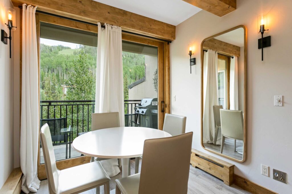 dining room of Antlers at Vail unit 508 with views to Vail Mountain