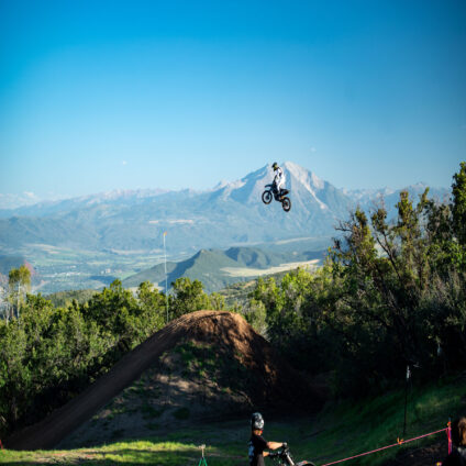 chief engineer parker herring flying on his dirt bike