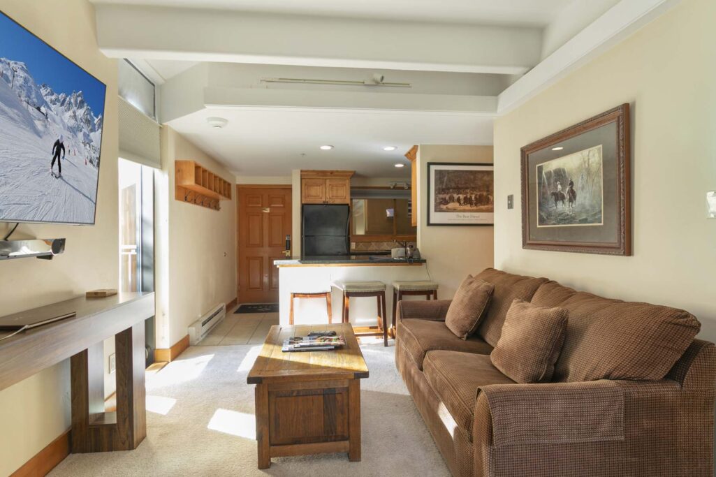 Living and kitchen area of Antlers at Vail studio 302