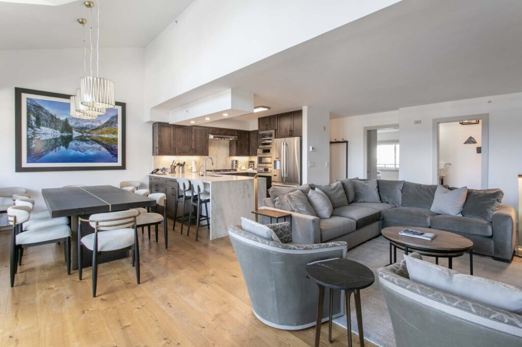 open living, kitchen and dining area of Antlers at Vail four-bedroom diamond residence 621